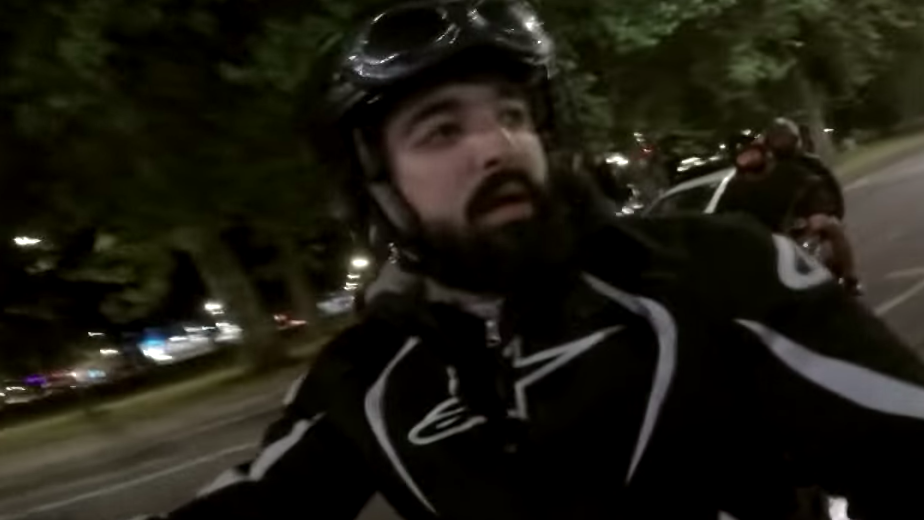 Biker fights off armed moped gang